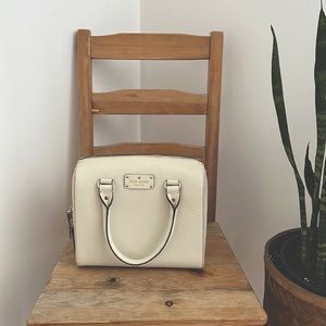 White Kate Spade purse. Alessa Wellesley satchel